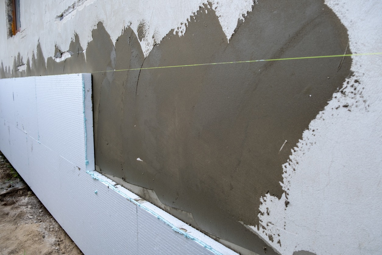 Installation of styrofoam insulation sheets