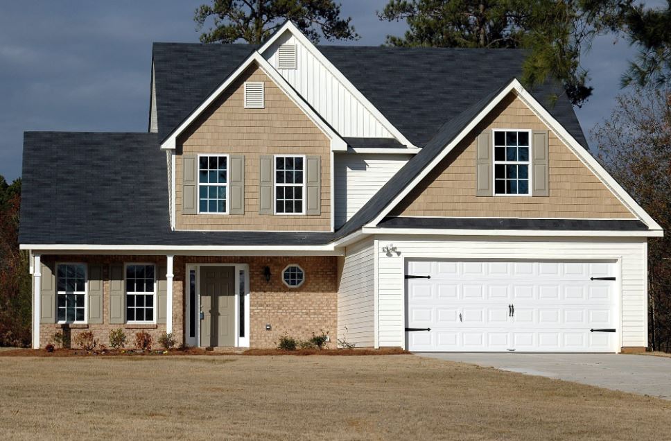 brown-and-white-wooden-house