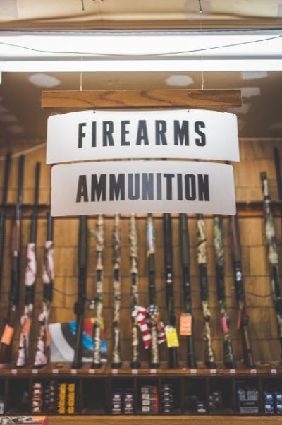 hanging-signage-inside-a-gun-shop