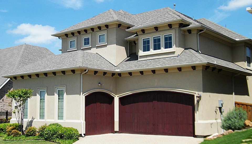 Spanish style house with garage