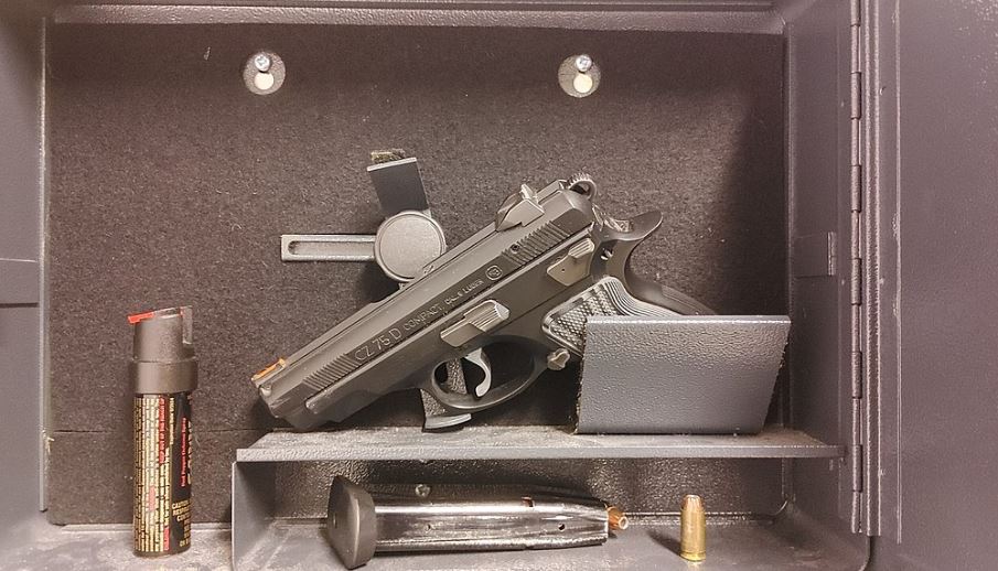 a gun placed inside a gun safe