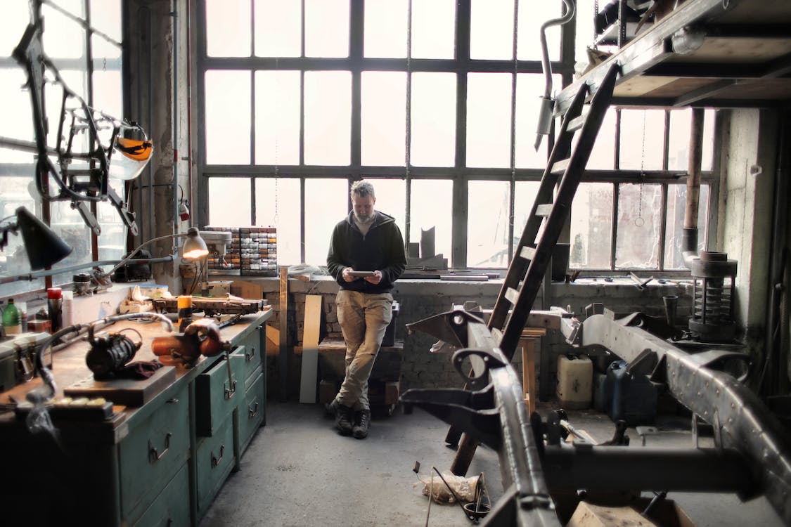 man-in-an-old-workshop image