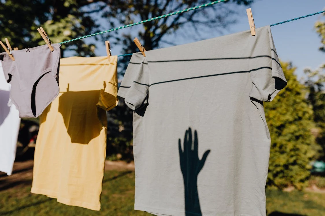 Clothes pinned to a clothesline on a sunny day